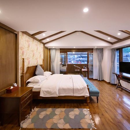 Fenghuang Slowly Time Inn ภายนอก รูปภาพ